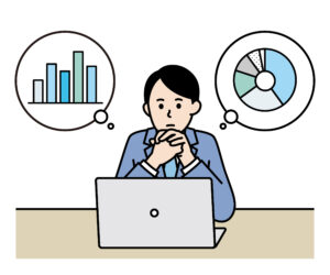 パソコンの前で悩む人