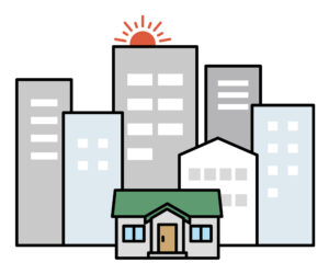 ビルに囲まれた家