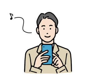 スマホを見ながら歩く人